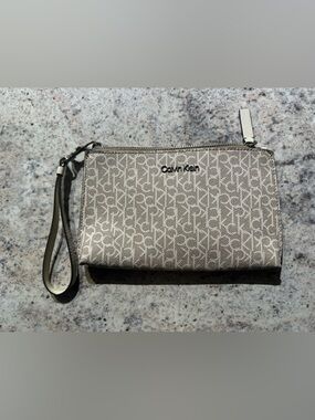 Calvin Klein Champagne Logo Wristlet with Removable Strap